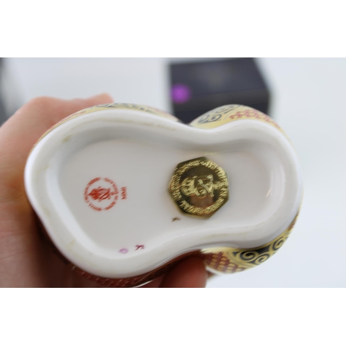 26 - Boxed Royal Crown Derby paperweight, Old Imari Snake, first quality with gold stopper.