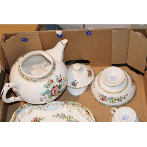 265 - A part Coalport tea service in the 'Ming Rose' pattern to include tea pot, sandwich / cake plates, s... 