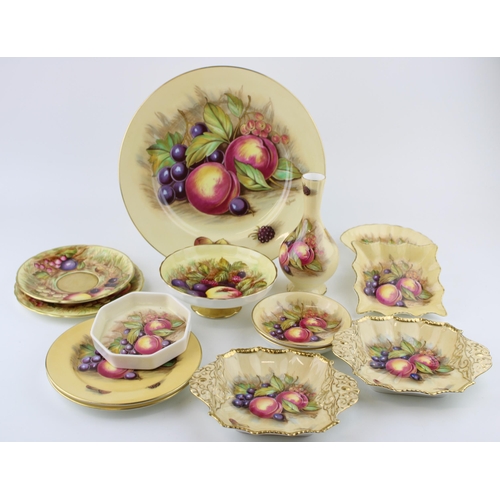 278 - A collection of Aynsley Orchard Gold, all signed D Jones, to include a dinner plates, pin dishes, a ... 