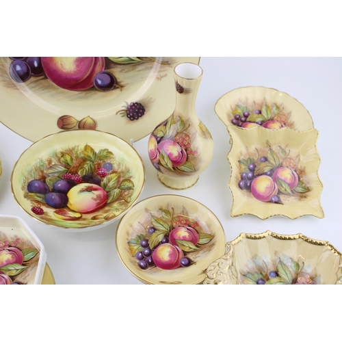 278 - A collection of Aynsley Orchard Gold, all signed D Jones, to include a dinner plates, pin dishes, a ... 