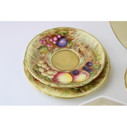 278 - A collection of Aynsley Orchard Gold, all signed D Jones, to include a dinner plates, pin dishes, a ... 