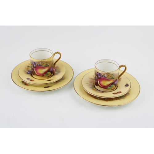 282 - Two Aynsley Orchard Gold coffee cans with saucers and side plates (6), 4 pieces signed D Jones.