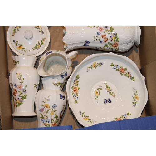 283 - A collection of Aynsley 'Cottage Garden' pattern ceramics to include vases, jugs and similar items t... 