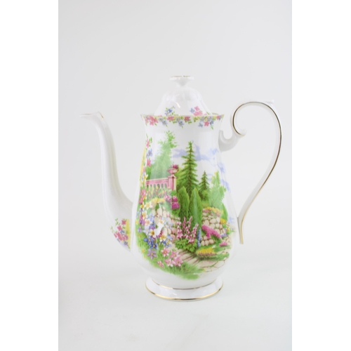 288 - Royal Albert coffee pot in the Kentish Rockery pattern, 23cm tall (chip to inner rim).