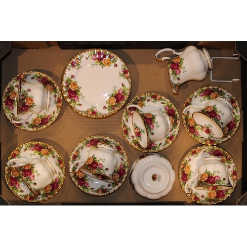 290 - A collection of Royal Albert Old Country Roses tea ware to include six trios, milk and sugar.