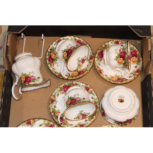 290 - A collection of Royal Albert Old Country Roses tea ware to include six trios, milk and sugar.