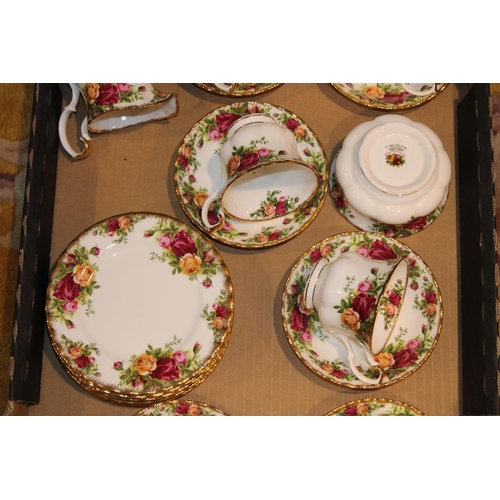 290 - A collection of Royal Albert Old Country Roses tea ware to include six trios, milk and sugar.