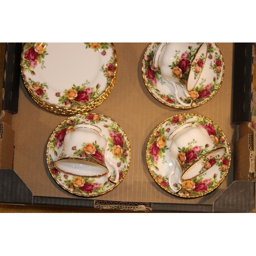 290 - A collection of Royal Albert Old Country Roses tea ware to include six trios, milk and sugar.