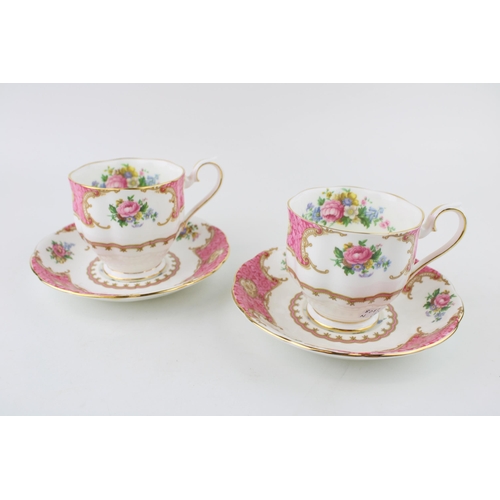 292 - A pair of Royal Albert cups and saucers in the 'Lady Carlyle' pattern. Height 9cm. (2)