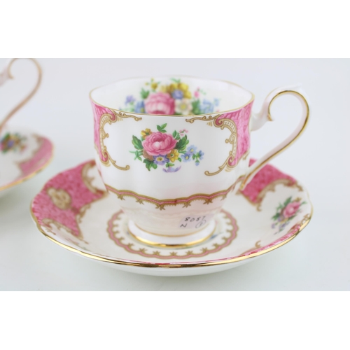 292 - A pair of Royal Albert cups and saucers in the 'Lady Carlyle' pattern. Height 9cm. (2)