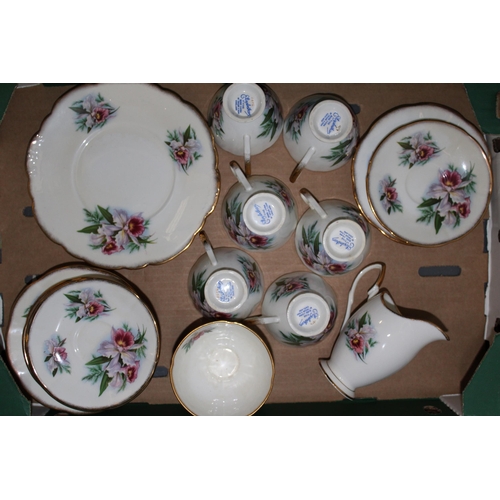 300 - Elizabethan Fine Bone China tea set to include six trios, cream, sugar and sandwich plate. (21)