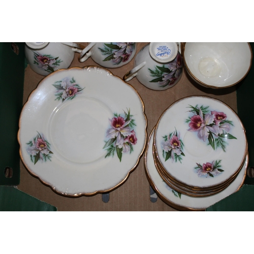 300 - Elizabethan Fine Bone China tea set to include six trios, cream, sugar and sandwich plate. (21)