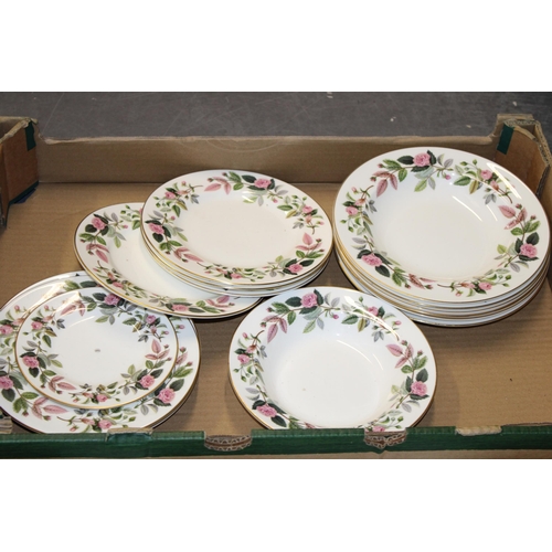 310 - A large collection of Wedgwood tea and dinner ware in the 'Hathaway Rose' pattern to include dinner ... 