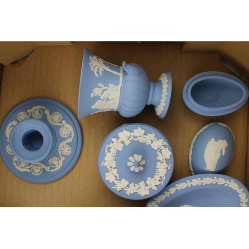 311 - A collection of Wedgwood Jasperware items to include vases, pin trays, heart shape box, candle stick... 