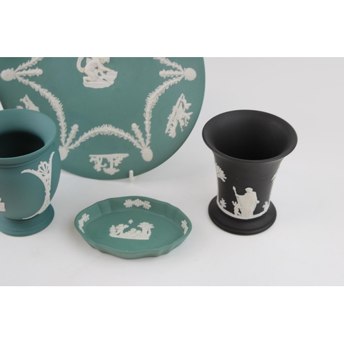 317 - A collection of Wedgwood Jasperware items in Teal and Black colours to include pair of vases, pin tr... 