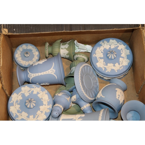 339 - Wedgwood Jasperware in blue, green and dark blue to include a trivet, vases, plates and others (Qty)... 