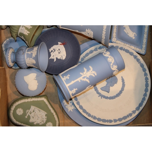 339 - Wedgwood Jasperware in blue, green and dark blue to include a trivet, vases, plates and others (Qty)... 