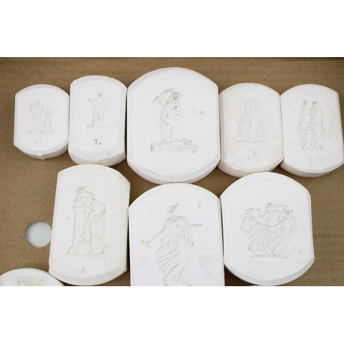 342 - A collection of Wedgwood Jasperware relief moulds, to include figures and puttis, stamped Wedgwood, ... 