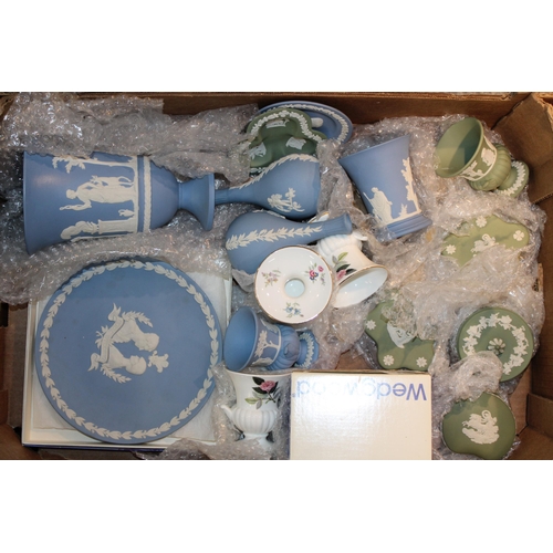 343 - A collection of Wedgwood Jasperware items to include vases, bud vases, lidded pots, trinket trays an... 