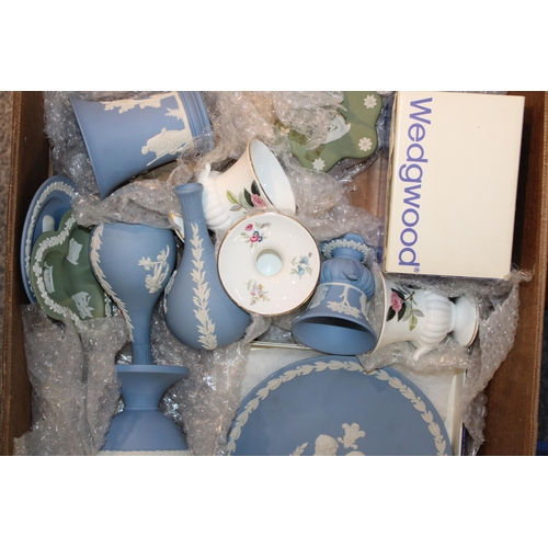 343 - A collection of Wedgwood Jasperware items to include vases, bud vases, lidded pots, trinket trays an... 