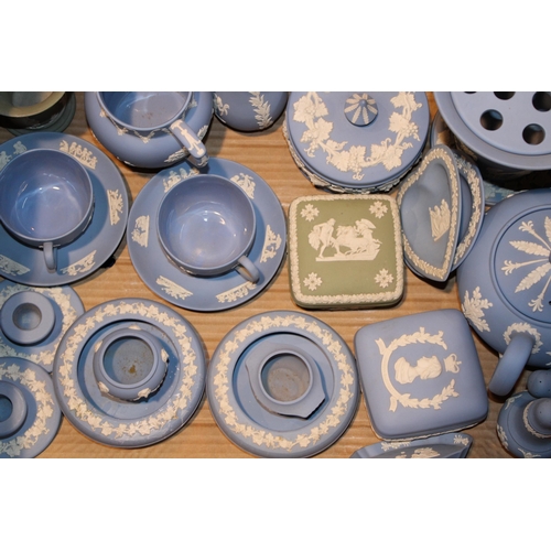 347 - A mixed collection of Wedgwood Jasperware items in blue and sage green, to include a pair of cups an... 