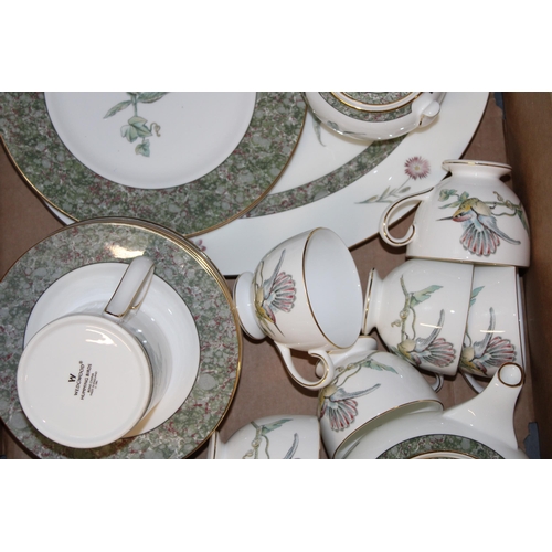 348 - Wedgwood teaware in the Humming Birds pattern to include a teapot, a large platter, 6 trios, a mug, ... 