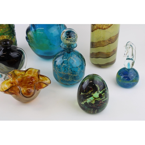 373 - A collection of Mdina glass to include a pulled ear vase, a decanter, a sea horse paperweight and ot... 