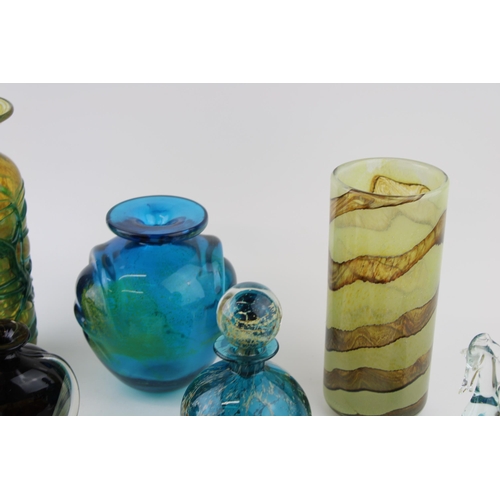 373 - A collection of Mdina glass to include a pulled ear vase, a decanter, a sea horse paperweight and ot... 