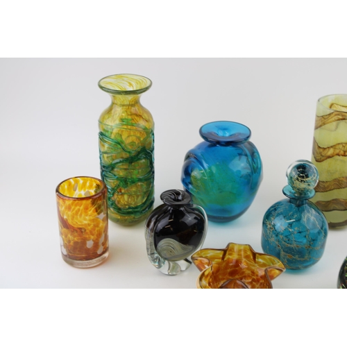 373 - A collection of Mdina glass to include a pulled ear vase, a decanter, a sea horse paperweight and ot... 