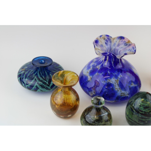 374 - A collection of studio glass to include a Mdina glass vase, orange /red, tapered form, paperweights,... 