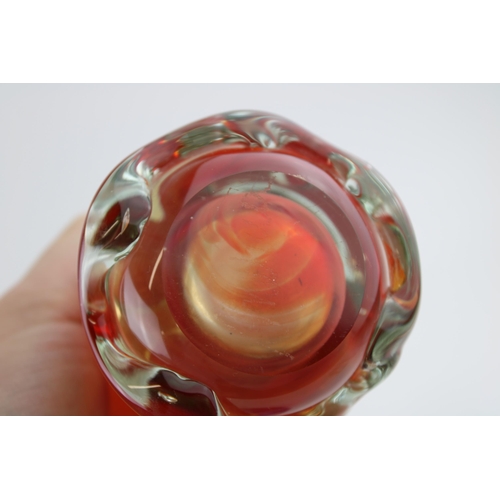 374 - A collection of studio glass to include a Mdina glass vase, orange /red, tapered form, paperweights,... 