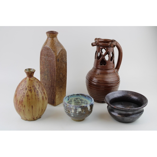 377 - A collection of studio pottery to include a puzzle jug (slight af), a studio ware bowl, two flagons ... 