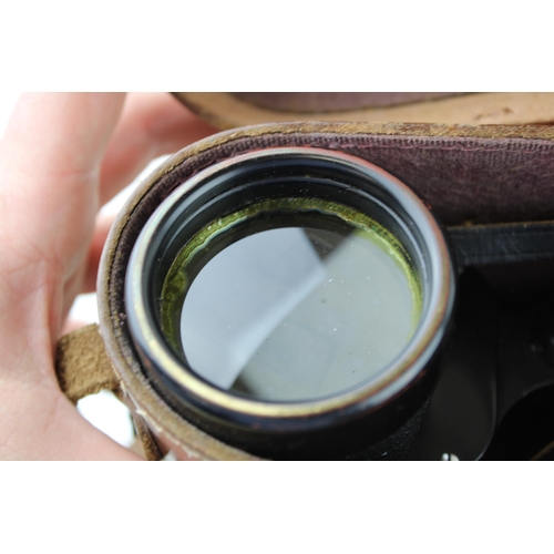 384 - Cased set of E Leitz Wetzlar 7 x 50 Marsept binoculars, serial number 26137, in a leather carry case... 