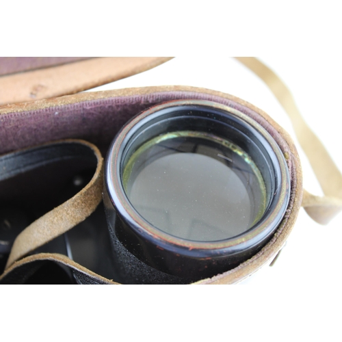 384 - Cased set of E Leitz Wetzlar 7 x 50 Marsept binoculars, serial number 26137, in a leather carry case... 