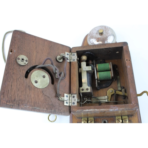 385 - An early c20th vintage wooden mahogany wall or signal box telephone with serial number 028515