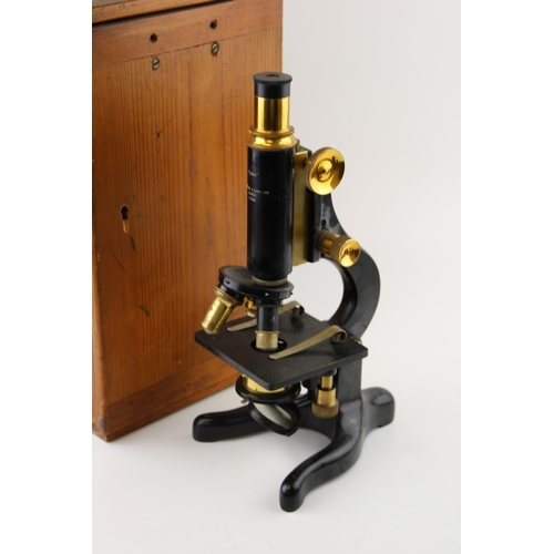 386 - An early c20th brass & steel microscope 'Kima' W. Watson & Sons Ltd, London '77168' in an original w... 