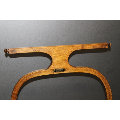 396 - An early 20th century 'Everneat' clothes horse / clothes rack in original finish raised on four ball... 