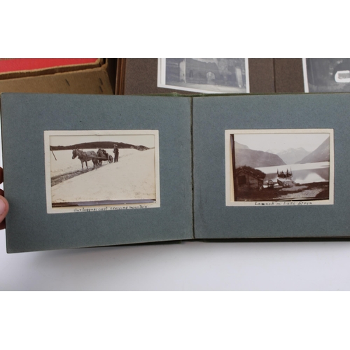 413 - A collection of eight photograph albums containing original travel and mountaineering images from Sc... 