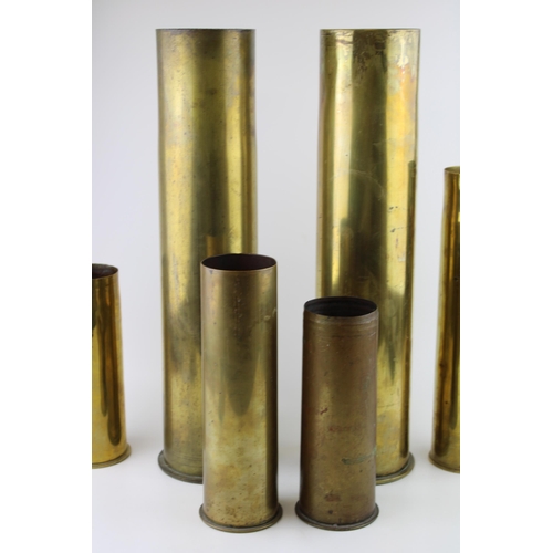 433 - A collection of six WW1 German brass shell casings of various sizes and calibres dated 1916, 1917 an... 