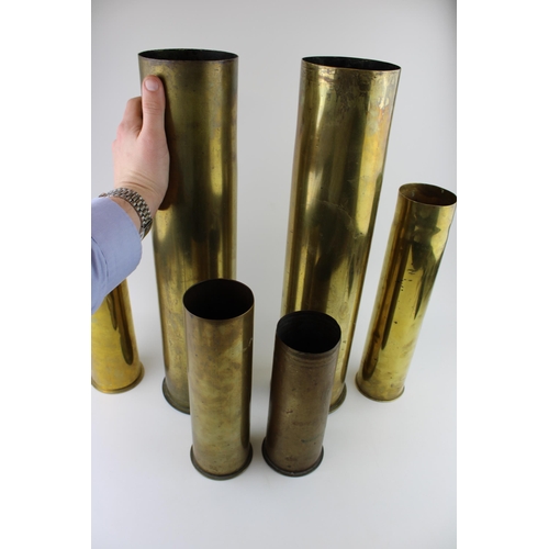 433 - A collection of six WW1 German brass shell casings of various sizes and calibres dated 1916, 1917 an... 