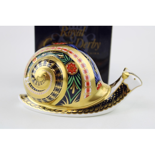 44 - Boxed Royal Crown Derby paperweight of a Garden Snail, first quality with gold stopper.