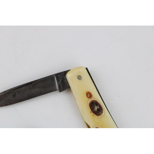 445 - An antique bone handle budding knife by G. Hall & Son together with another horn handle pocket / pen... 