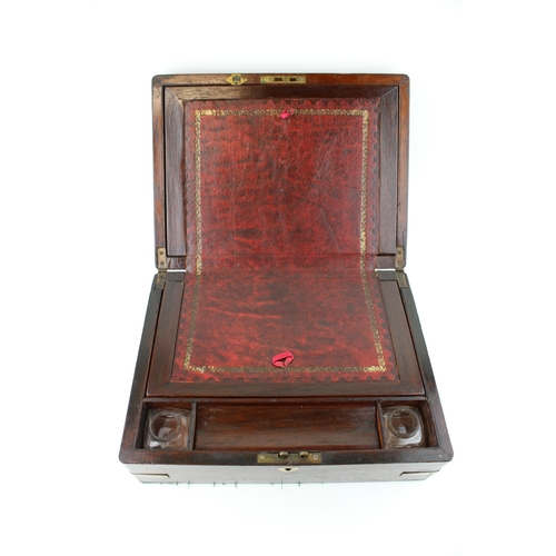 453 - 19th century mahogany writing slope, brass bound, brass escutcheon, 31cm wide.