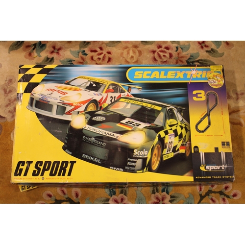 461 - A boxed Scalextric GT Sport set, Advanced Track System with Porsche 911 GTR3 / No 83 and 911 GTR3 / ... 