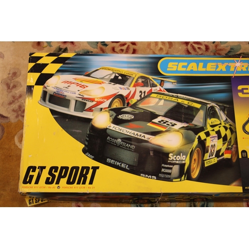 461 - A boxed Scalextric GT Sport set, Advanced Track System with Porsche 911 GTR3 / No 83 and 911 GTR3 / ... 