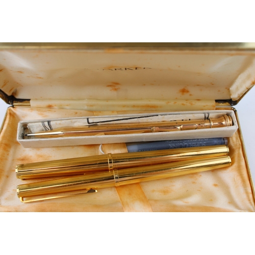 469 - A Parker gold plated fountain pen with gold nib and a gold plated Parker rollerball pen & a gold fil... 