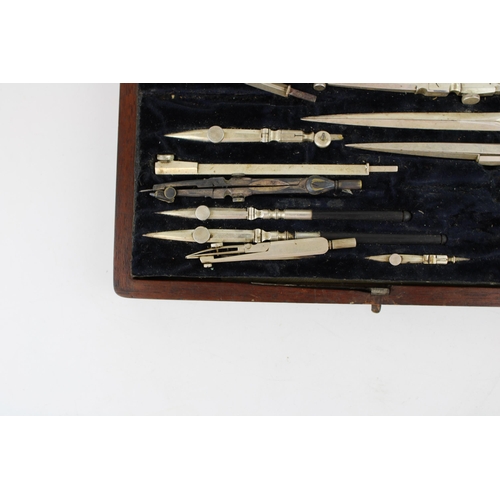 470 - A c19th Victorian Draughtsman's drawing set and rulers with a cased meerschaum pipe shaped as a lady... 