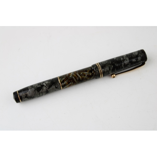 471 - A Swam Visofil Mabie Todd & co Ltd marbled fountain pen with 14 carat gold nib c1930s