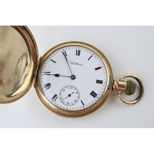 479 - A top winding full hunter Waltham pocket watch in gold plated Dennison case. (case diameter 50.5mm)