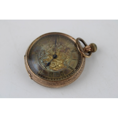 486 - A ladies 9ct gold top winding pocket watch housed in a leather wristlet. Gross weight 25.3g. Case di... 